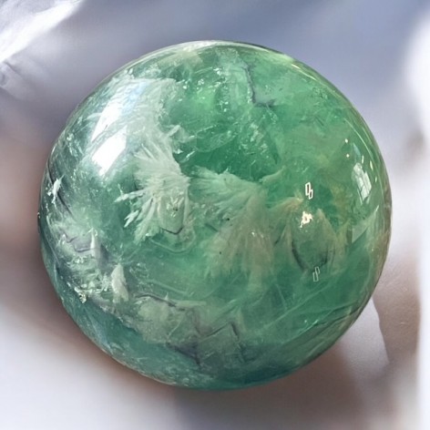 Natural fluorite sphere, angel feathers